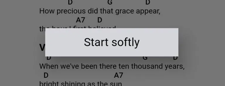 A popup that says 'Start softly' displays over a song.