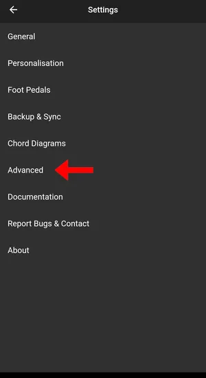 The settings menu in the SongbookPro app. An arrow points to a tab titled 'Advanced'.